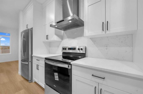 94 Royston Park Nw, Calgary, AB - Indoor Photo Showing Kitchen With Stainless Steel Kitchen