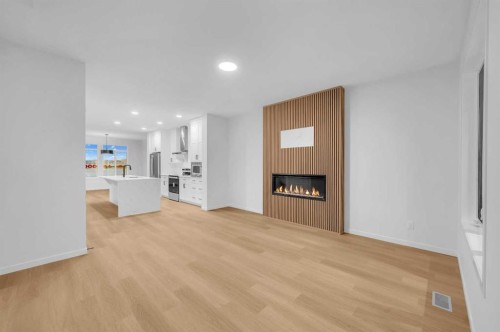 94 Royston Park Nw, Calgary, AB - Indoor With Fireplace