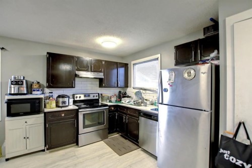 144 Whitmire Road Ne, Calgary, AB - Indoor Photo Showing Kitchen