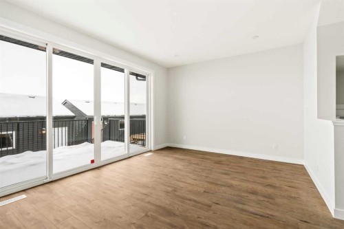46 Starling Boulevard Nw, Calgary, AB - Indoor Photo Showing Other Room