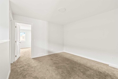 46 Starling Boulevard Nw, Calgary, AB - Indoor Photo Showing Other Room