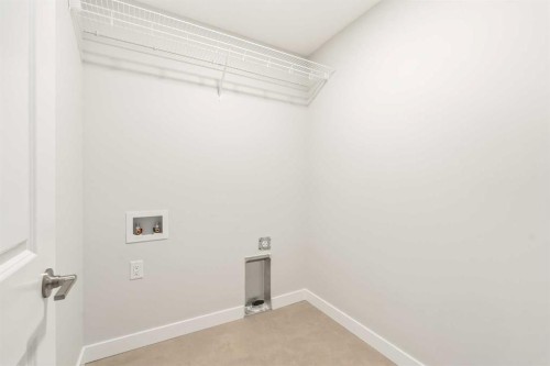 46 Starling Boulevard Nw, Calgary, AB - Indoor Photo Showing Other Room