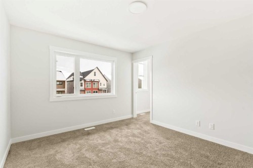 46 Starling Boulevard Nw, Calgary, AB - Indoor Photo Showing Other Room