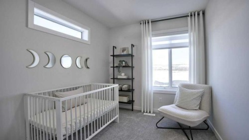 770 Wolf Willow Boulevard Se, Calgary, AB - Indoor Photo Showing Bedroom