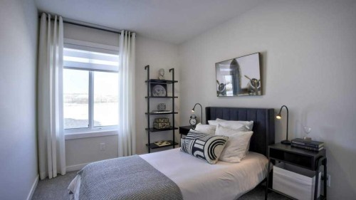 770 Wolf Willow Boulevard Se, Calgary, AB - Indoor Photo Showing Bedroom