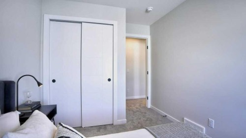770 Wolf Willow Boulevard Se, Calgary, AB - Indoor Photo Showing Bedroom