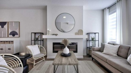 770 Wolf Willow Boulevard Se, Calgary, AB - Indoor Photo Showing Living Room With Fireplace