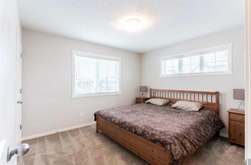 12 Legacy Main Street Se, Calgary, AB - Indoor Photo Showing Bedroom