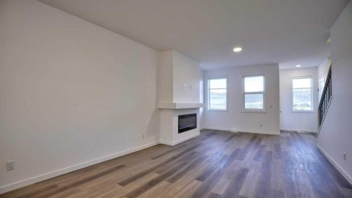 774 Wolf Willow Boulevard Se, Calgary, AB - Indoor With Fireplace