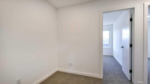 774 Wolf Willow Boulevard Se, Calgary, AB - Indoor Photo Showing Other Room