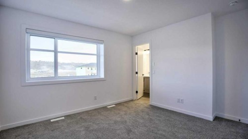 774 Wolf Willow Boulevard Se, Calgary, AB - Indoor Photo Showing Other Room