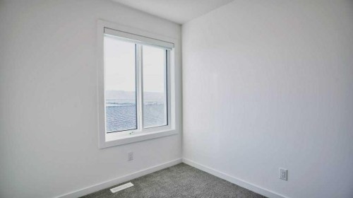 774 Wolf Willow Boulevard Se, Calgary, AB - Indoor Photo Showing Other Room