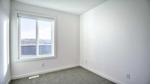 774 Wolf Willow Boulevard Se, Calgary, AB - Indoor Photo Showing Other Room