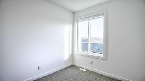 774 Wolf Willow Boulevard Se, Calgary, AB - Indoor Photo Showing Other Room