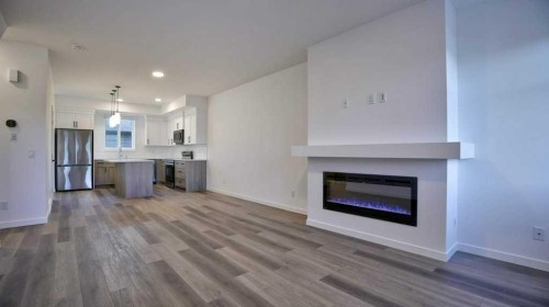 774 Wolf Willow Boulevard Se, Calgary, AB - Indoor With Fireplace