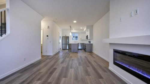 774 Wolf Willow Boulevard Se, Calgary, AB - Indoor With Fireplace