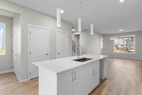 127 Montane Link Se, High River, AB - Indoor Photo Showing Kitchen With Double Sink