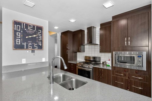 45 Redstone Drive Ne, Calgary, AB - Indoor Photo Showing Kitchen With Double Sink