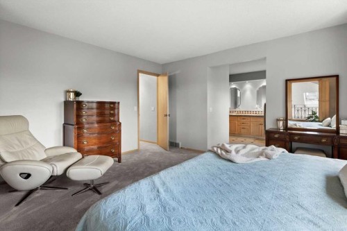 75 Hawkside Close Nw, Calgary, AB - Indoor Photo Showing Bedroom