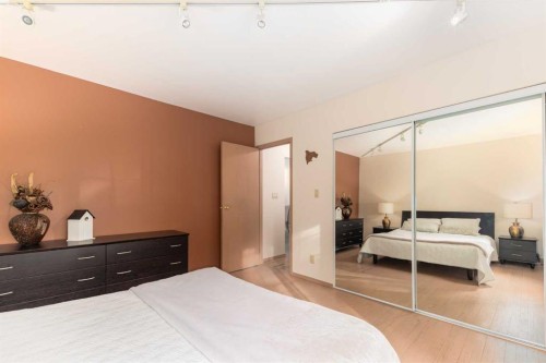 231031 Forestry Way, Bragg Creek, AB - Indoor Photo Showing Bedroom