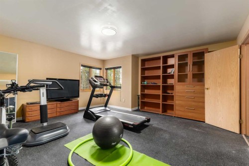 231031 Forestry Way, Bragg Creek, AB - Indoor Photo Showing Gym Room