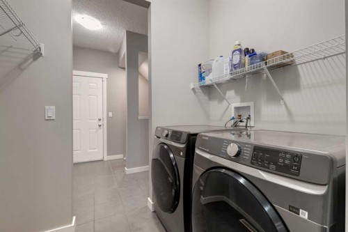 106 Silverado Skies Drive Sw, Calgary, AB - Indoor Photo Showing Laundry Room
