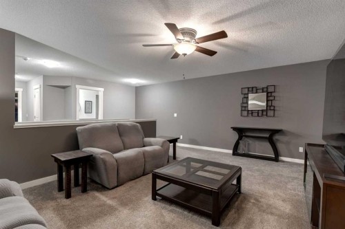 106 Silverado Skies Drive Sw, Calgary, AB - Indoor Photo Showing Living Room