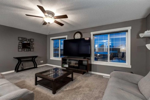106 Silverado Skies Drive Sw, Calgary, AB - Indoor Photo Showing Living Room