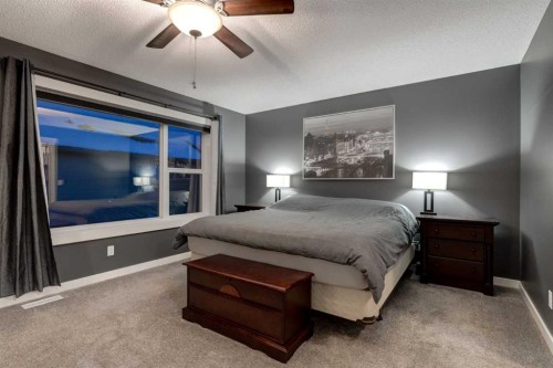 106 Silverado Skies Drive Sw, Calgary, AB - Indoor Photo Showing Bedroom