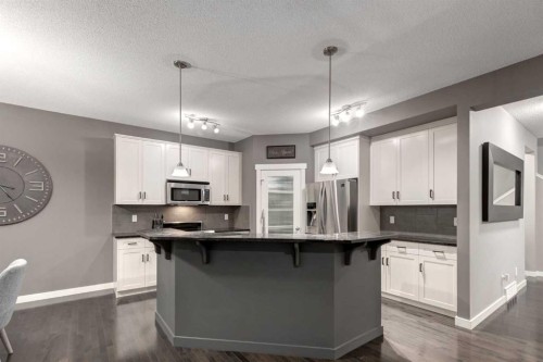 106 Silverado Skies Drive Sw, Calgary, AB - Indoor Photo Showing Kitchen With Upgraded Kitchen