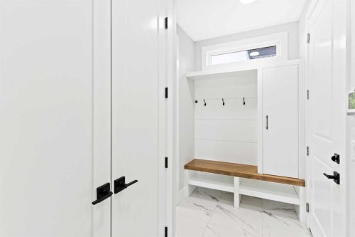 61 Sunvalley View, Cochrane, AB - Indoor Photo Showing Other Room