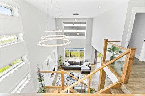 61 Sunvalley View, Cochrane, AB - Indoor Photo Showing Other Room