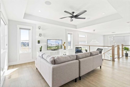 61 Sunvalley View, Cochrane, AB - Indoor Photo Showing Living Room