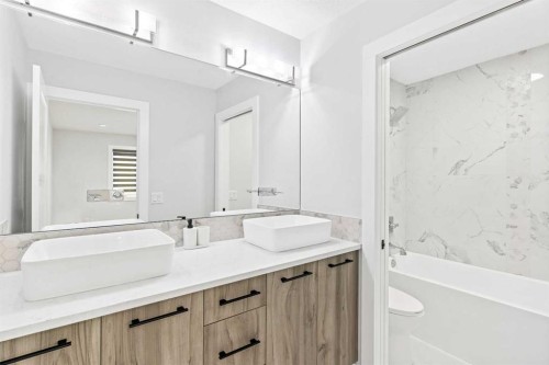 61 Sunvalley View, Cochrane, AB - Indoor Photo Showing Bathroom