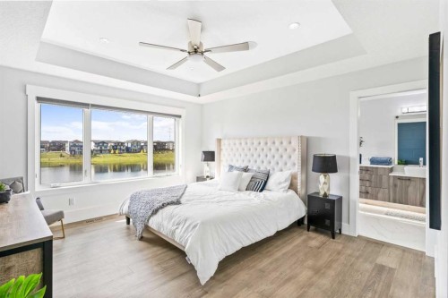 61 Sunvalley View, Cochrane, AB - Indoor Photo Showing Bedroom