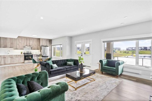 61 Sunvalley View, Cochrane, AB - Indoor Photo Showing Living Room