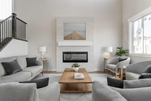 160 Vantage Drive, Cochrane, AB - Indoor Photo Showing Living Room With Fireplace