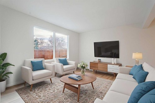 110-330 Canterbury Drive Sw, Calgary, AB - Indoor Photo Showing Living Room