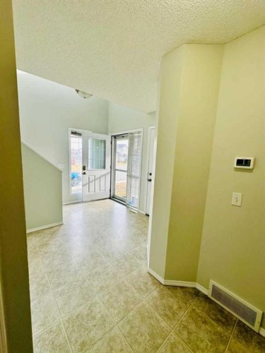8 Royal Elm Way Nw, Calgary, AB - Indoor Photo Showing Other Room