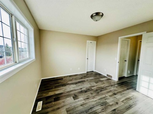 8 Royal Elm Way Nw, Calgary, AB - Indoor Photo Showing Other Room