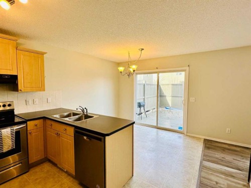 8 Royal Elm Way Nw, Calgary, AB - Indoor Photo Showing Kitchen With Double Sink