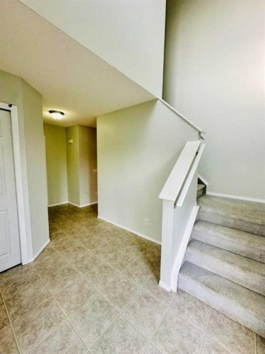 8 Royal Elm Way Nw, Calgary, AB - Indoor Photo Showing Other Room