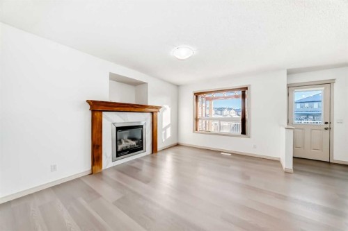 287 Covepark Rise Ne, Calgary, AB - Indoor Photo Showing Living Room With Fireplace