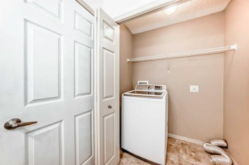 287 Covepark Rise Ne, Calgary, AB - Indoor Photo Showing Laundry Room