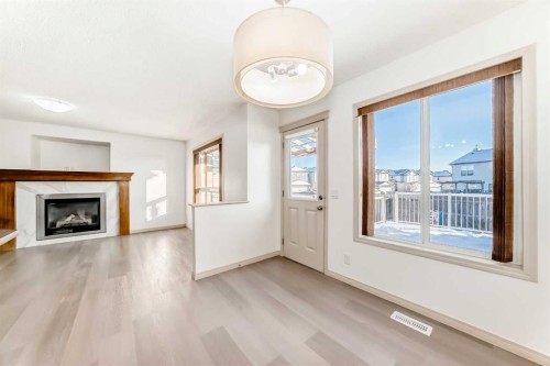 287 Covepark Rise Ne, Calgary, AB - Indoor Photo Showing Living Room With Fireplace