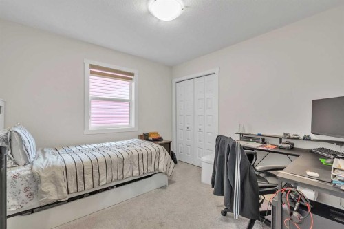7672 80 Avenue Ne, Calgary, AB - Indoor Photo Showing Bedroom