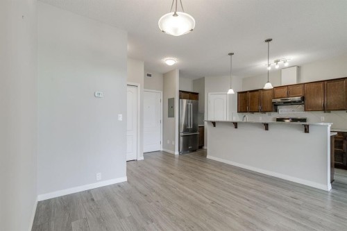 432-1 Crystal Green Lane, Okotoks, AB - Indoor Photo Showing Kitchen