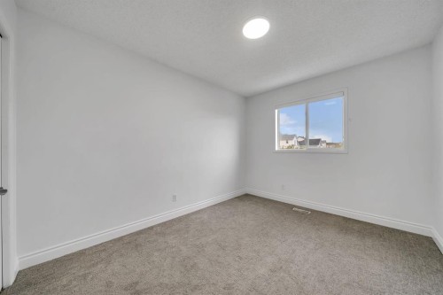 11 Hidden Valley Link Nw, Calgary, AB - Indoor Photo Showing Other Room