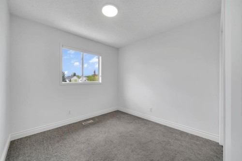 11 Hidden Valley Link Nw, Calgary, AB - Indoor Photo Showing Other Room
