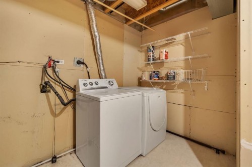 11 Hidden Valley Link Nw, Calgary, AB - Indoor Photo Showing Laundry Room